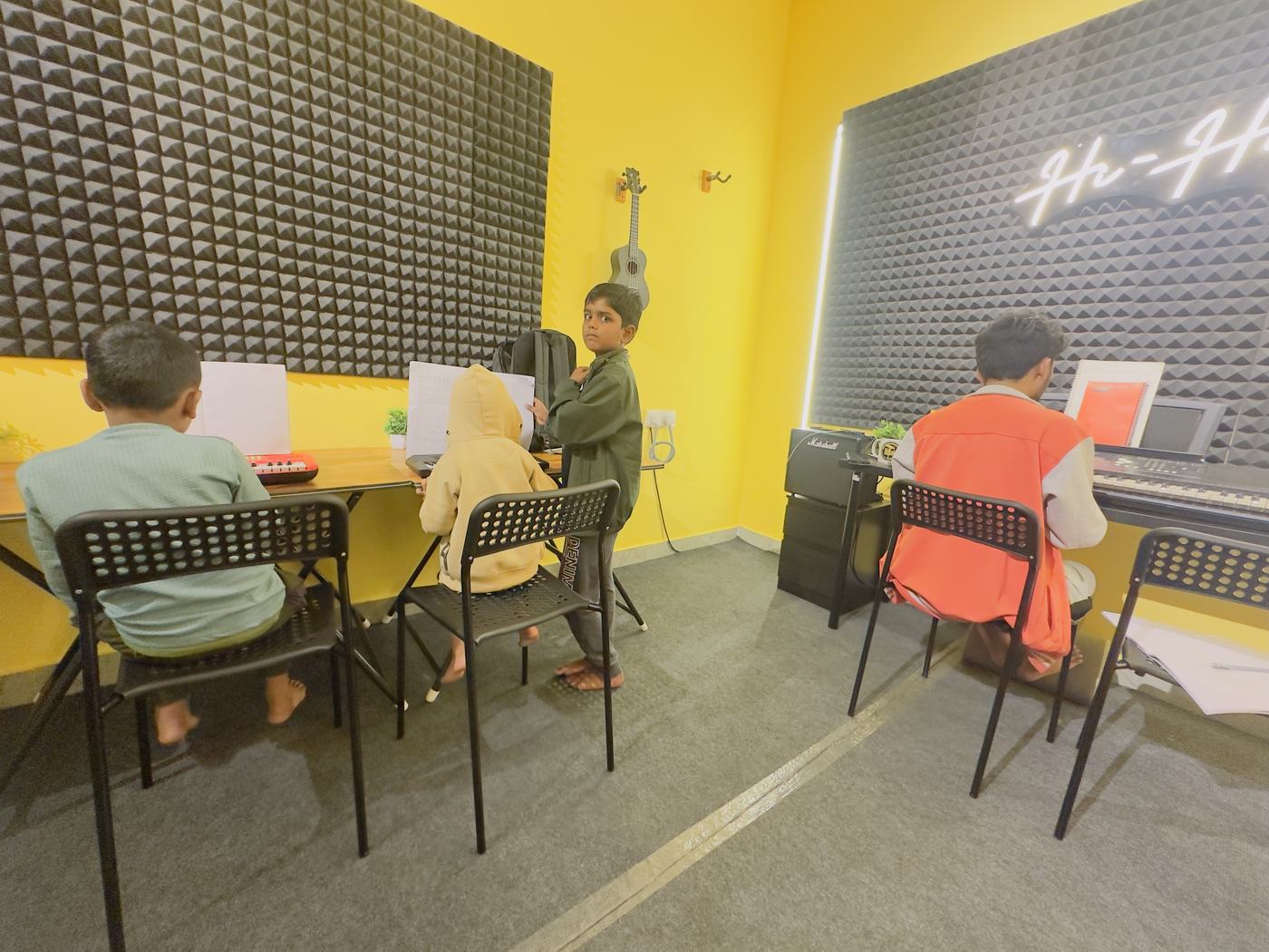 Kids learning keyboard at Hi-Hats